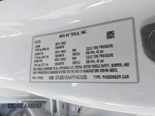 2023 Tesla Model 3 z VIN 5YJ3E1EA4PF482005, wystawiony jako IAAI lot #41363157 z przebiegiem 26 013 mil mil oraz . Historia ofert i sprzedaży dostępna na DreamBid. Obrazek 9.