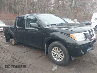 2014 Nissan Frontier SV z VIN 1N6AD0EV2EN747006, wystawiony jako IAAI lot #41657007 z przebiegiem 76 939 mil mil oraz . Historia ofert i sprzedaży dostępna na DreamBid. Obrazek 1.