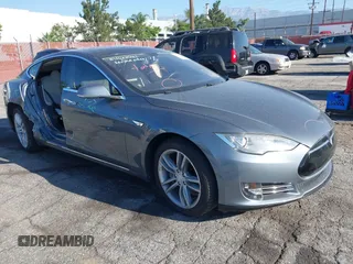 2014 Tesla Model S 60 with VIN 5YJSA1S11EFP35998, listed as a IAAI auction lot 42316563 with 83,835 mi miles and . Bid and sale history available at DreamBid. Image 1.