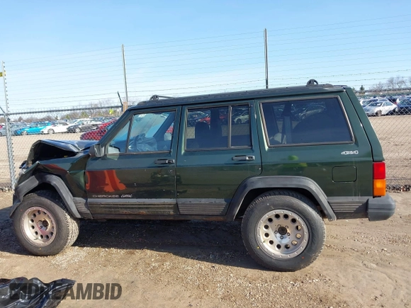 1996 Jeep Cherokee Sport with VIN 1J4FJ68S2TL299150, listed as a IAAI auction lot 41932867 with 142,761 mi miles. Bid and sale history available at carsss.com. Image 14.