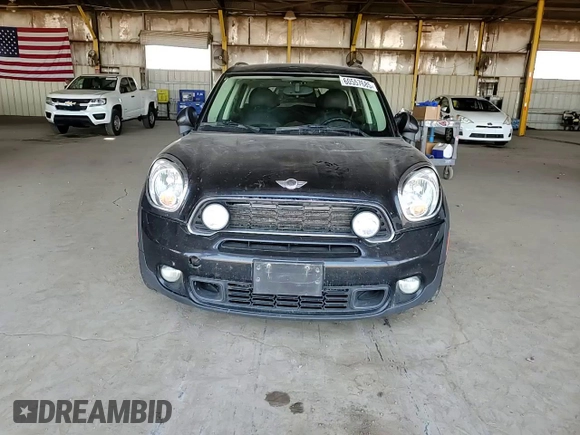 2011 MINI Countryman S with VIN WMWZC5C54BWM10218, listed as a Copart auction lot 60557685 with 192,422 mi miles and Salvage title. Bid and sale history available at DreamBid. Image 13.