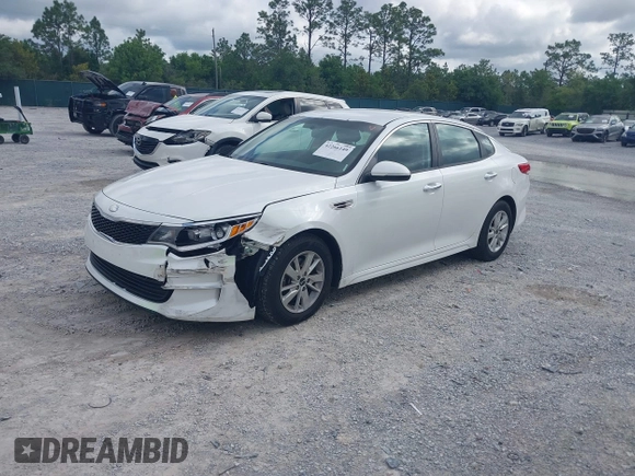 2017 Kia Optima LX z VIN 5XXGT4L32HG161091, wystawiony jako IAAI lot #42266149 z przebiegiem 166 254 mil mil oraz . Historia ofert i sprzedaży dostępna na DreamBid. Obrazek 17.