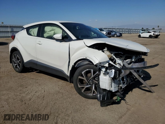 2019 Toyota C-HR XLE with VIN JTNKHMBX1K1014761, listed as a Copart auction lot 54963025 with 15,890 mi miles and Salvage Title. Bid and sale history available at DreamBid. Image 4.