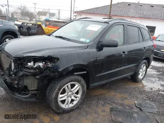 2012 Hyundai Santa Fe GLS with VIN 5XYZG3ABXCG159336, listed as a IAAI auction lot 41635699 with 128,975 mi miles. Bid and sale history available at carsss.com. Image 17.
