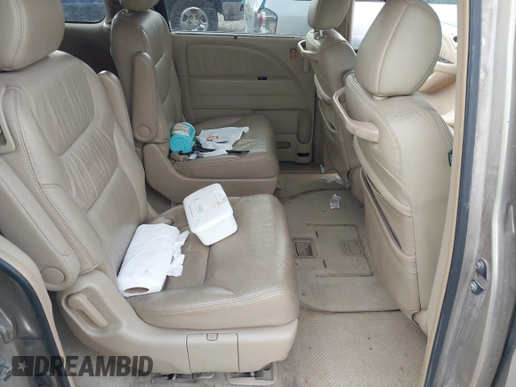 2006 Honda Odyssey EX-L z VIN 5FNRL38756B458936, wystawiony jako IAAI lot #42201902 z przebiegiem 339 976 mil mil oraz . Historia ofert i sprzedaży dostępna na DreamBid. Obrazek 8.