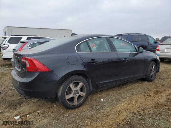 2012 Volvo S60 T5 with VIN YV1622FS7C2140817, listed as a Copart auction lot 89001115 with 97,569 mi miles and Salvage Title. Bid and sale history available at carsss.com. Image 3.