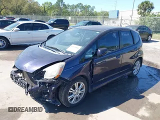 2009 Honda Fit Sport z VIN JHMGE88409S030427, wystawiony jako IAAI lot #41723036 z przebiegiem 146 586 mil mil oraz . Historia ofert i sprzedaży dostępna na DreamBid. Obrazek 2.