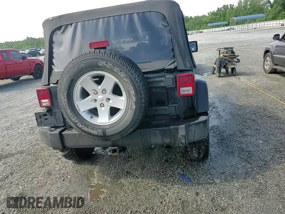 2014 Jeep Wrangler Sport z VIN 1C4AJWAG0EL147523, wystawiony jako Copart lot #59682015 z przebiegiem 196 258 mil mil oraz Szkoda całkowita • Salvage title. Historia ofert i sprzedaży dostępna na DreamBid. Obrazek 13.