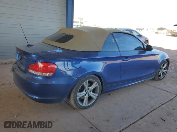 2010 BMW 1 Series 128i with VIN WBAUL7C50AVJ77979, listed as a Copart auction lot 79938664 with 53,740 mi miles and Salvage title. Bid and sale history available at DreamBid. Image 3.