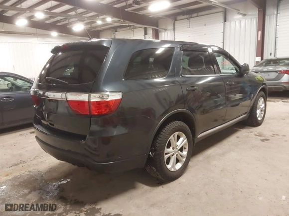 2013 Dodge Durango SXT with VIN 1C4RDJAG8DC500490, listed as a IAAI auction lot 41982309 with 183,861 mi miles. Bid and sale history available at carsss.com. Image 4.