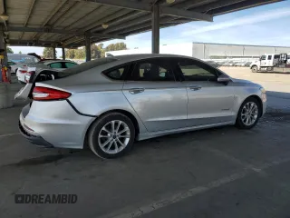 2019 Ford Fusion Hybrid SE with VIN 3FA6P0LU7KR262160, listed as a Copart auction lot 51969555 with 99,699 mi miles and Salvage Title. Bid and sale history available at carsss.com. Image 3.