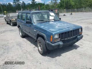 1998 Jeep Cherokee Sport with VIN 1J4FT68S6WL272337, listed as a IAAI auction lot 42147195 with 302,764 mi miles. Bid and sale history available at carsss.com. Image 1.