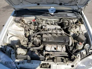 1995 Honda Civic LX z VIN JHMEG8656SS016258, wystawiony jako Copart lot #72629664 z przebiegiem 64 865 mil mil oraz Szkody całkowita. Historia ofert i sprzedaży dostępna na DreamBid. Obrazek 11.