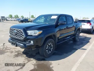 2021 Toyota Tacoma SR z VIN 3TMCZ5AN3MM421868, wystawiony jako IAAI lot #42003665 z przebiegiem 39 380 mil mil oraz . Historia ofert i sprzedaży dostępna na DreamBid. Obrazek 17.