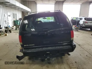 1997 Chevrolet Blazer LS z VIN 1GNDT13W7V2236355, wystawiony jako Copart lot #57983265 z przebiegiem Nie podano mil oraz Nie do naprawy • Non repairable. Historia ofert i sprzedaży dostępna na DreamBid. Obrazek 6.
