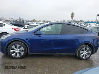 2022 Tesla Model Y Long Range with VIN 7SAYGDEE8NF511395, listed as a IAAI auction lot 41595310 with 65,156 mi miles and . Bid and sale history available at carsss.com. Image 14.