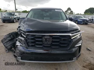 2024 Honda Pilot EX-L 8 Passenger with VIN 5FNYG2H47RB014185, listed as a Copart auction lot 67668944 with 3,981 mi miles and Salvage Title. Bid and sale history available at carsss.com. Image 5.