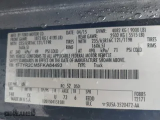 2015 Ford Transit Cargo Van with VIN 1FTYR2CM5FKA84493, listed as a IAAI auction lot 42009809 with 116,379 mi miles. Bid and sale history available at carsss.com. Image 9.