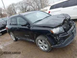 2015 Jeep Compass High Altitude Edition with VIN 1C4NJDEB9FD396502, listed as a IAAI auction lot 41757194 with 157,928 mi miles. Bid and sale history available at carsss.com. Image 13.