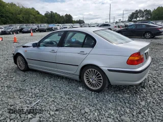 2003 BMW 3 Series 330i with VIN WBAEV53423KM30265, listed as a Copart auction lot 70214374 with 152,171 mi miles and Salvage Title. Bid and sale history available at carsss.com. Image 2.
