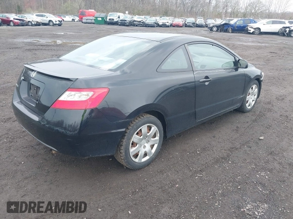 2010 Honda Civic Cpe LX with VIN 2HGFG1B65AH506256, listed as a IAAI auction lot 41942862 with 142,683 mi miles. Bid and sale history available at carsss.com. Image 4.