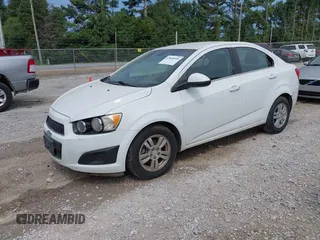 2012 Chevrolet Sonic LT with VIN 1G1JC5SH1C4126756, listed as a IAAI auction lot 42868558 with 163,633 mi miles and . Bid and sale history available at DreamBid. Image 2.