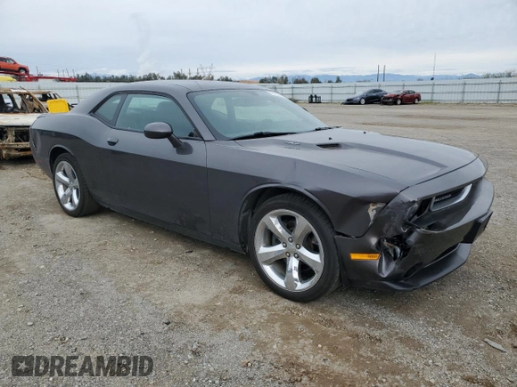 2013 Dodge Challenger R/T z VIN 2C3CDYBT0DH741262, wystawiony jako Copart lot #49185255 z przebiegiem 97 902 mil mil oraz Szkoda całkowita • Salvage title. Historia ofert i sprzedaży dostępna na DreamBid. Obrazek 4.