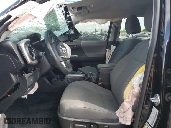 2023 Toyota Tacoma SR z VIN 3TYCZ5ANXPT136237, wystawiony jako Copart lot #62584345 z przebiegiem 32 674 mil mil oraz Szkoda całkowita • Salvage title. Historia ofert i sprzedaży dostępna na DreamBid. Obrazek 7.