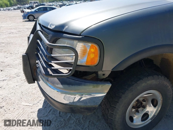 2003 Ford F-150 XL with VIN 1FTRF18243NB29920, listed as a IAAI auction lot 42037138 with 230,215 mi miles and . Bid and sale history available at DreamBid. Image 6.