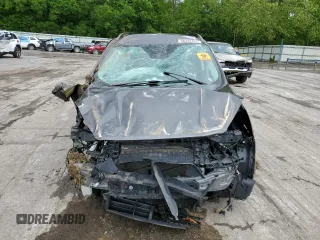 2017 Ford Escape SE z VIN 1FMCU9GD7HUB76204, wystawiony jako Copart lot #58334725 z przebiegiem Nie podano mil oraz Szkoda całkowita • Salvage title. Historia ofert i sprzedaży dostępna na DreamBid. Obrazek 5.