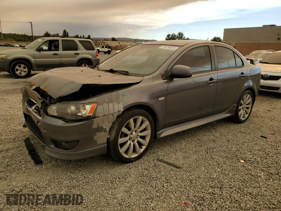 2011 Mitsubishi Lancer GTS with VIN JA32U8FW2BU005251, listed as a Copart auction lot 70879824 with 124,317 mi miles and Salvage Title. Bid and sale history available at carsss.com. Image 1.