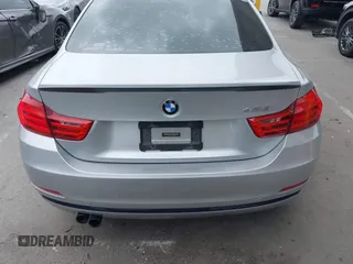 2015 BMW 4 Series 428i z VIN WBA3N7C50FK222398, wystawiony jako IAAI lot #42211723 z przebiegiem 149 853 mil mil oraz . Historia ofert i sprzedaży dostępna na DreamBid. Obrazek 16.