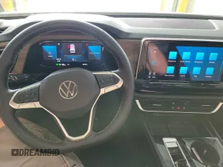 2024 Volkswagen Atlas SE with VIN 1V2HR2CA2RC556331, listed as a IAAI auction lot 42806429 with 25,239 mi miles and . Bid and sale history available at DreamBid. Image 14.