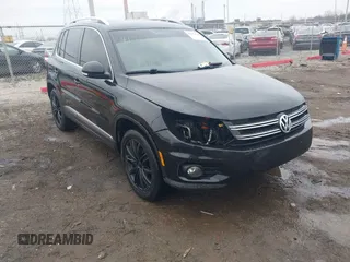 2012 Volkswagen Tiguan SE with VIN WVGAV7AX0CW602713, listed as a IAAI auction lot 41558520 with 95,678 mi miles and . Bid and sale history available at DreamBid. Image 6.