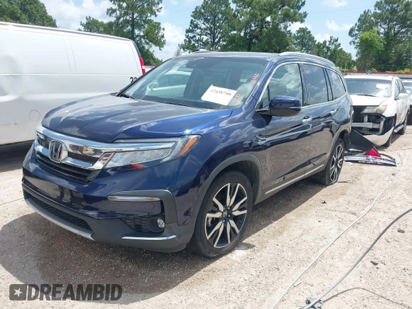 2022 Honda Pilot Touring 7-Passenger with VIN 5FNYF5H61NB019768, listed as a IAAI auction lot 42438780 with Not provided miles and . Bid and sale history available at DreamBid. Image 18.