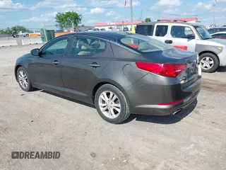 2012 Kia Optima EX with VIN 5XXGN4A79CG075818, listed as a IAAI auction lot 42151671 with 87,645 mi miles. Bid and sale history available at carsss.com. Image 3.