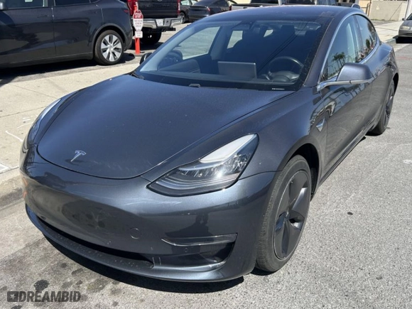 2018 Tesla Model 3 Long Range Battery with VIN 5YJ3E1EA8JF026497, listed as a IAAI auction lot 41987950 with 72,373 mi miles. Bid and sale history available at carsss.com. Image 2.