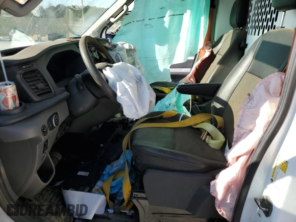 2021 Ford Transit Cargo z VIN 1FTYE1C81MKA44840, wystawiony jako Copart lot #43557725 z przebiegiem Nie podano mil oraz Czysty tytuł • Clean title. Historia ofert i sprzedaży dostępna na DreamBid. Obrazek 7.