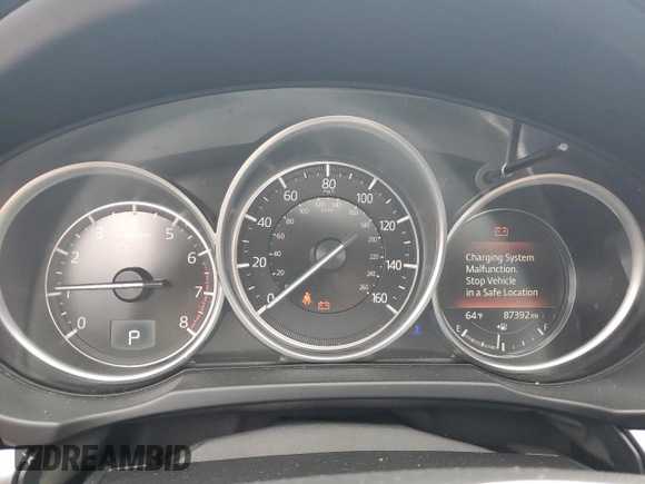 2020 Mazda CX-5 Touring z VIN JM3KFBCM2L0750223, wystawiony jako Copart lot #56300415 z przebiegiem 87 392 mil mil oraz Szkoda całkowita • Salvage title. Historia ofert i sprzedaży dostępna na DreamBid. Obrazek 9.