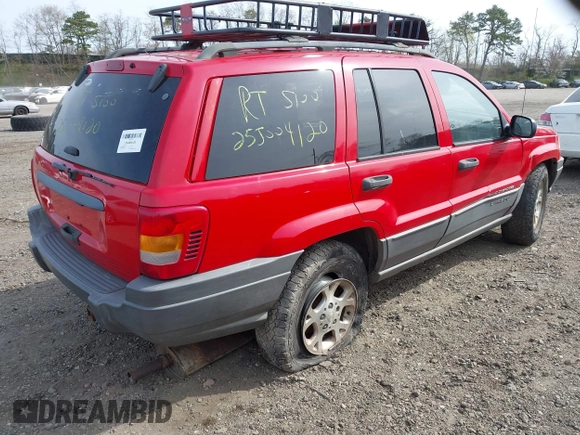 2001 Jeep Grand Cherokee Laredo with VIN 1J4GX48SX1C522670, listed as a IAAI auction lot 42111708 with Not provided miles and . Bid and sale history available at DreamBid. Image 4.