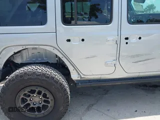 2023 Jeep Wrangler Rubicon with VIN 1C4JJXFG0PW522651, listed as a IAAI auction lot 42112210 with 7,744 mi miles and . Bid and sale history available at carsss.com. Image 6.