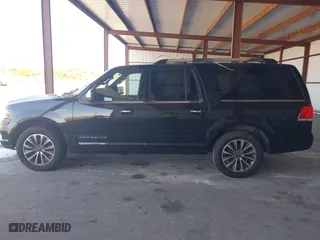 2015 Lincoln Navigator L with VIN 5LMJJ3JT0FEJ12569, listed as a IAAI auction lot 41909517 with 165,631 mi miles. Bid and sale history available at carsss.com. Image 13.