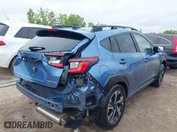 2024 Subaru Crosstrek Premium z VIN JF2GUADC6RH338290, wystawiony jako IAAI lot #42341194 z przebiegiem 10 379 mil mil oraz . Historia ofert i sprzedaży dostępna na DreamBid. Obrazek 4.