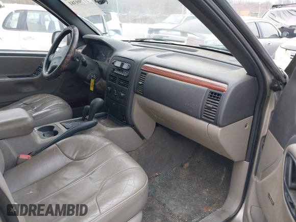 1999 Jeep Grand Cherokee Laredo с VIN 1J4GW58N4XC676836, выставлен на аукционе IAAI как лот 41799381 с пробегом 203 784 миль миль и . История ставок и продаж доступна на DreamBid. Изображение 5.
