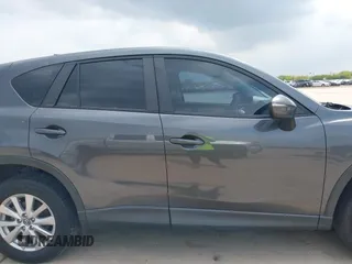 2016 Mazda CX-5 Sport with VIN JM3KE4BY8G0921243, listed as a IAAI auction lot 42102663 with 111,960 mi miles and . Bid and sale history available at DreamBid. Image 13.