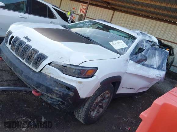 2021 Jeep Cherokee Trailhawk with VIN 1C4PJMBX4MD153086, listed as a IAAI auction lot 41132030 with 56,367 mi miles and . Bid and sale history available at DreamBid. Image 20.