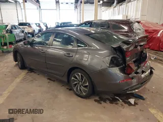 2022 Honda Insight Touring with VIN 19XZE4F96NE008687, listed as a IAAI auction lot 41653624 with 32,663 mi miles and . Bid and sale history available at DreamBid. Image 3.