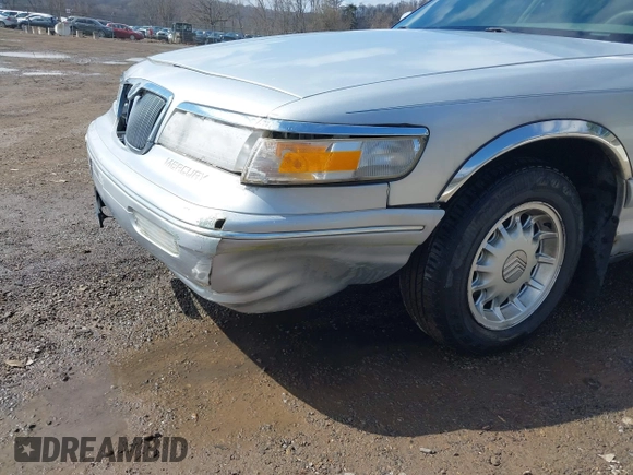 1997 Mercury Grand Marquis LS with VIN 2MELM75W3VX717801, listed as a IAAI auction lot 41920075 with 173,730 mi miles and . Bid and sale history available at DreamBid. Image 17.
