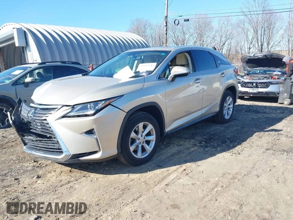 2016 Lexus RX 450h z VIN 2T2BGMCA7GC007006, wystawiony jako IAAI lot #41999343 z przebiegiem 124 912 mil mil oraz . Historia ofert i sprzedaży dostępna na DreamBid. Obrazek 2.