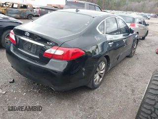 2012 Infiniti M with VIN JN1BY1AP5CM333975, listed as a IAAI auction lot 41701701 with 130,828 mi miles and . Bid and sale history available at DreamBid. Image 4.